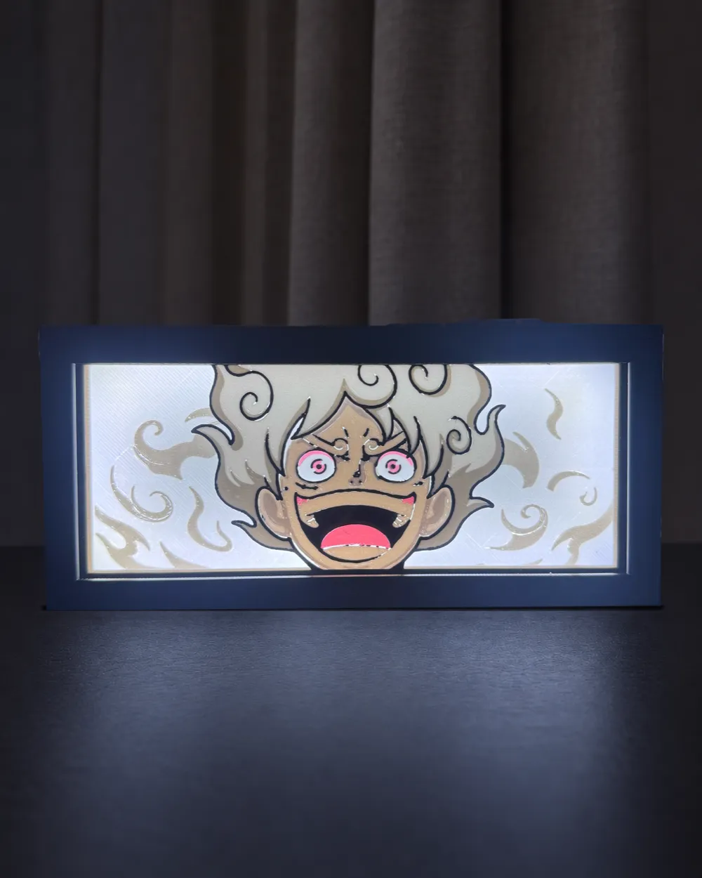 Gear 5 Luffy anime light box lit up on a dark table